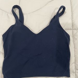 Navy blue Lululemon top.
